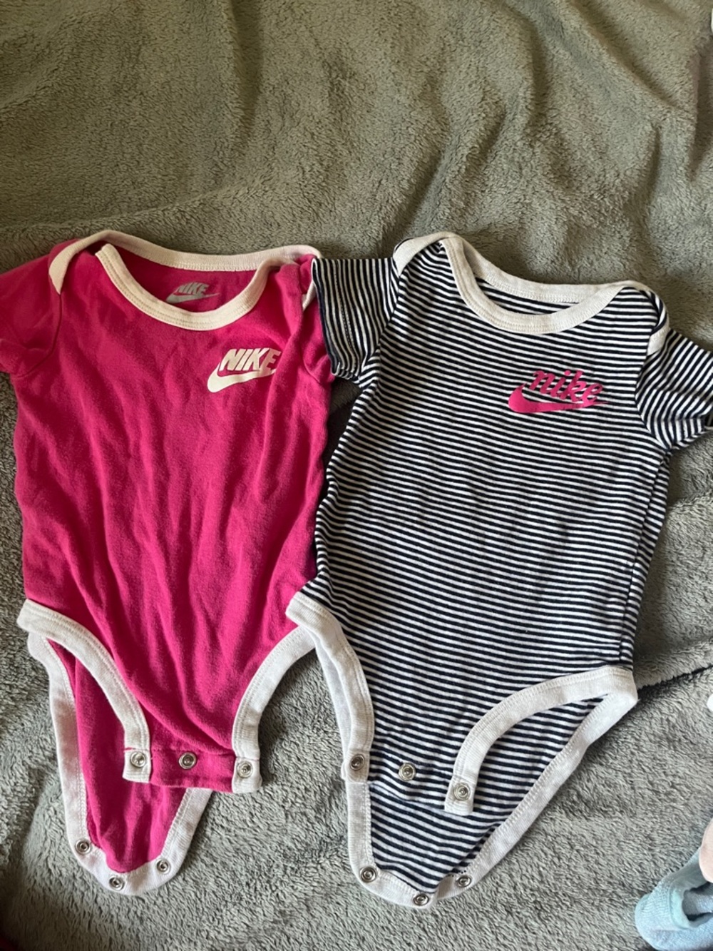 Nike Pink Solid and Black-White Striped Baby One-Pieces